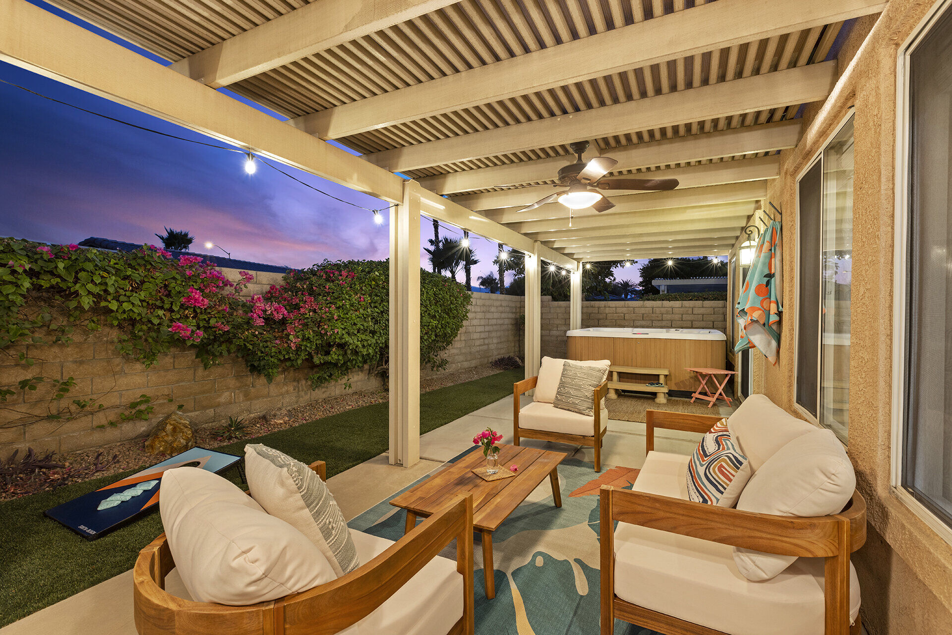 Backyard overview showing pool and entertainment areas
